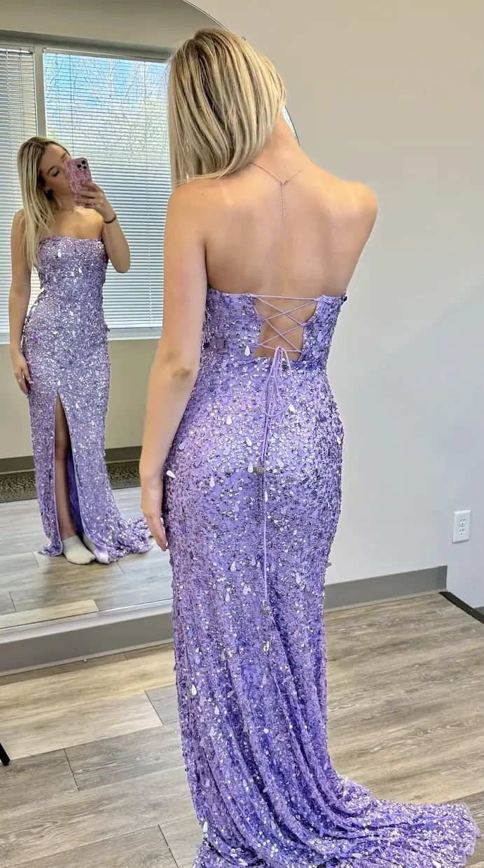 client wearing a sparking purple prom dress